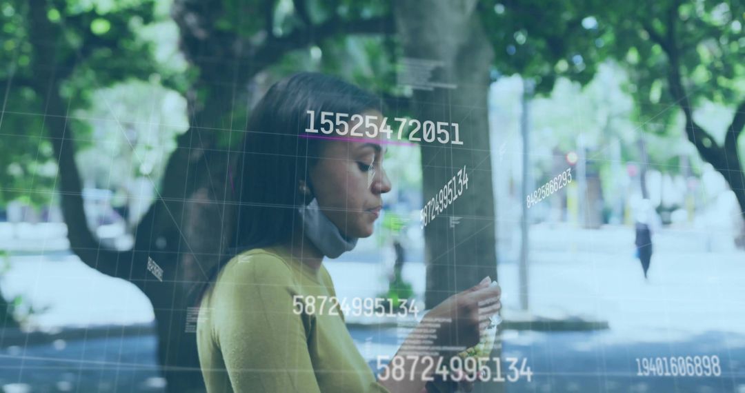 Futuristic Numeric Data Overlay on Smartphone in Tree-Lined Park