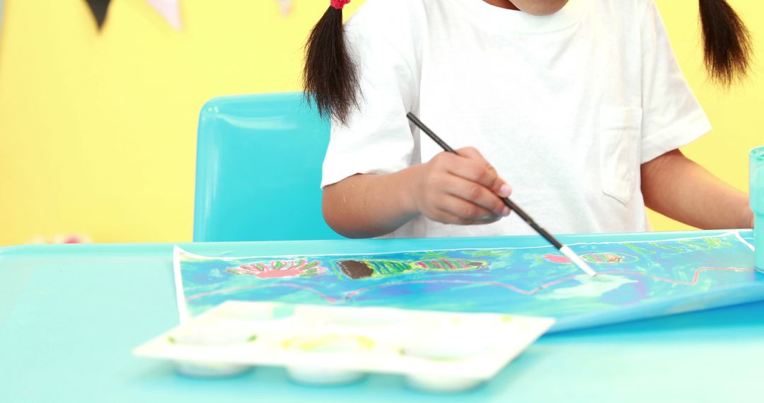 Young Child Painting Vibrant Underwater Scene - Free Images, Stock Photos and Pictures on Pikwizard.com