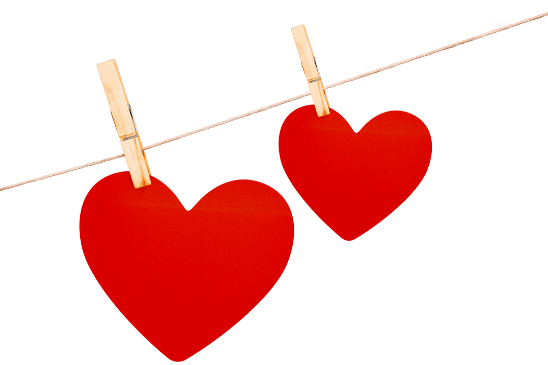 Transparent Red Hearts Hanging on a Line with Clothespins