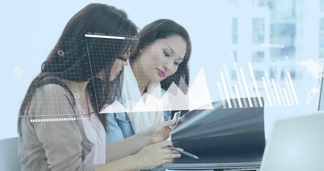 Two Women Analyzing Financial Data with Graph Overlay - Free Images, Stock Photos and Pictures on Pikwizard.com