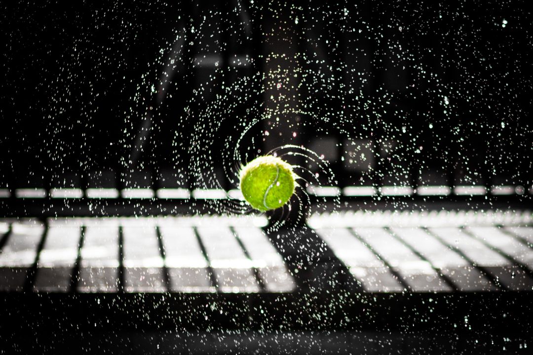 Water Droplets Spinning Off Tennis Ball in Mid-air - Free Images, Stock Photos and Pictures on Pikwizard.com