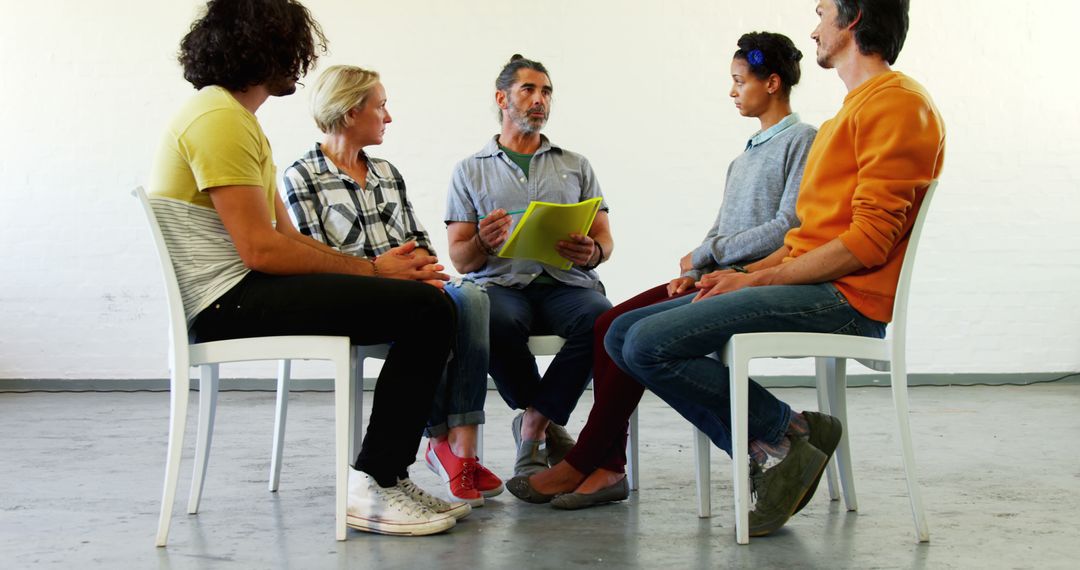 Diverse Group Sitting in Circle Engaging in Group Discussion - Free Images, Stock Photos and Pictures on Pikwizard.com