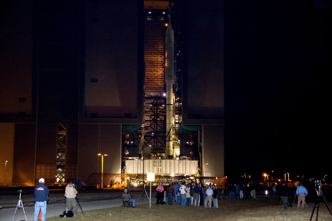 Media Awaits Nighttime Rollout of Ares I-X at Kennedy Space Center
