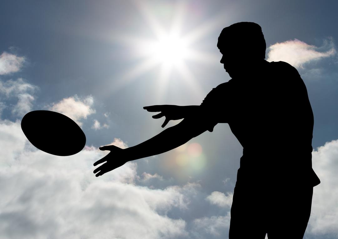 Silhouette of player catching a rugby ball against sky in background - Free Images, Stock Photos and Pictures on Pikwizard.com
