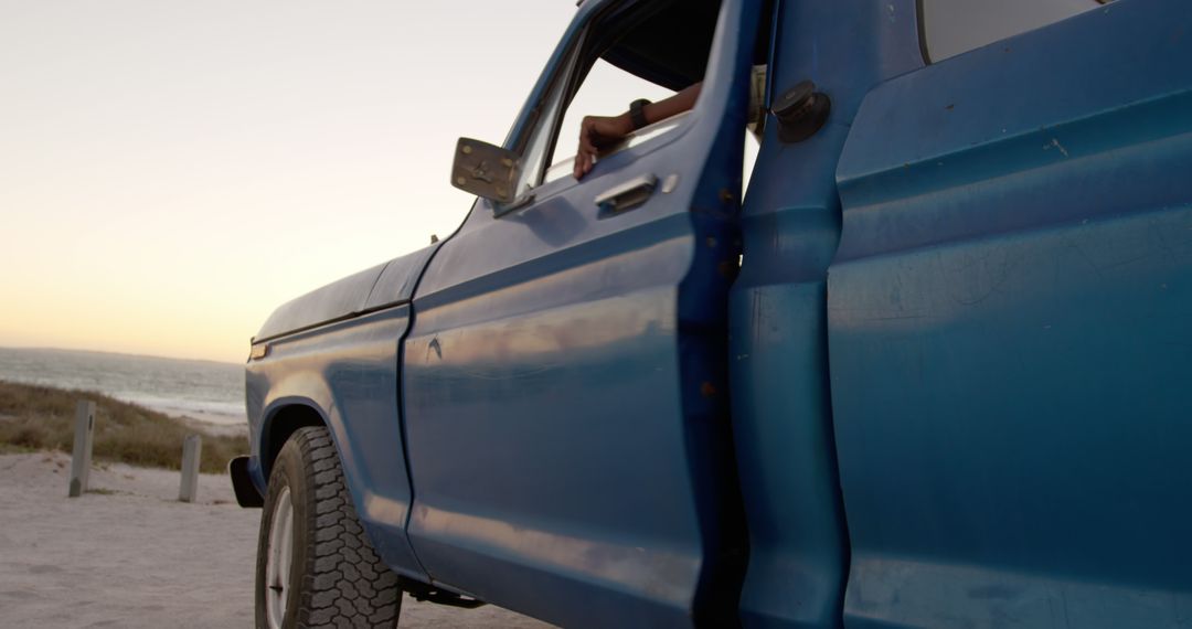 Vintage Blue Truck Near Beach at Sunset - Free Images, Stock Photos and Pictures on Pikwizard.com