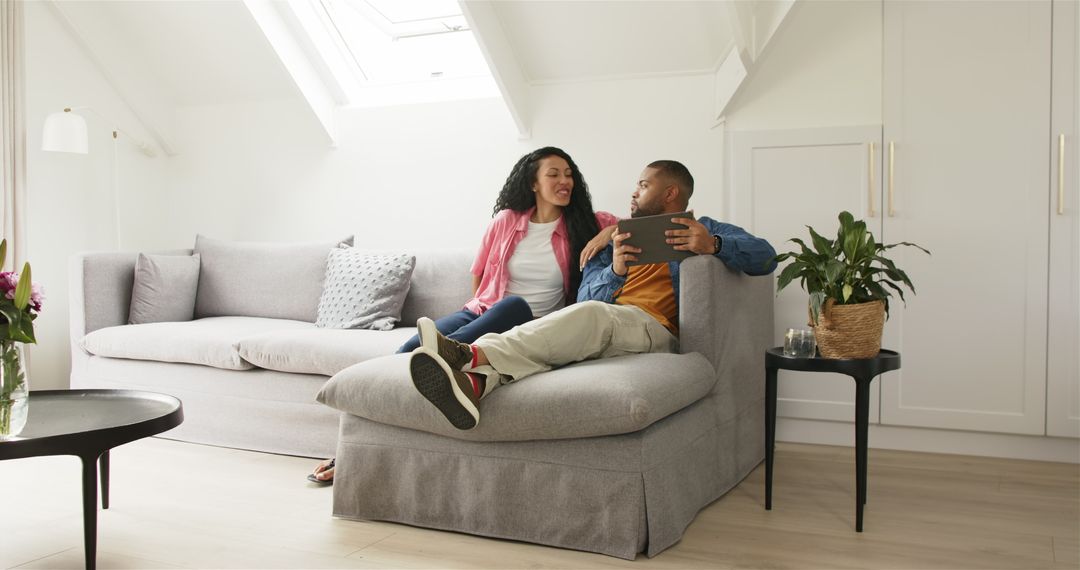 Excited Couple Celebrating Pregnancy at Home Together