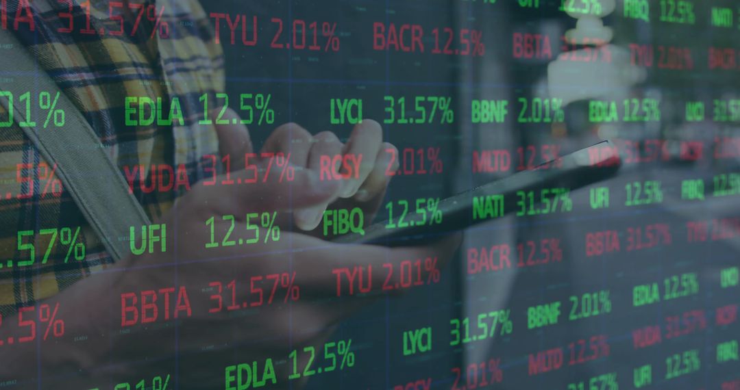 Man Analyzing Digital Stock Data on Tablet with Displayed Ticker