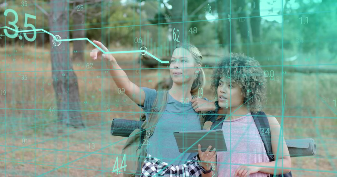 Hikers exploring with augmented reality navigation overlay using tablet in forest clearing