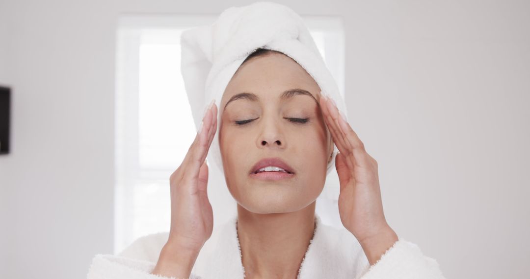 Woman Relaxing with Head Wrapped in Towel After Bath - Free Images, Stock Photos and Pictures on Pikwizard.com