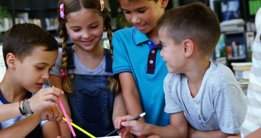 Diverse Group of Children Collaborating on School Project