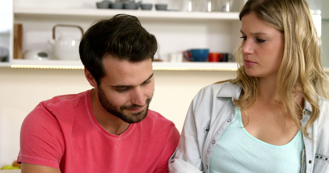 Couple Having Conversation at Home - Free Images, Stock Photos and Pictures on Pikwizard.com