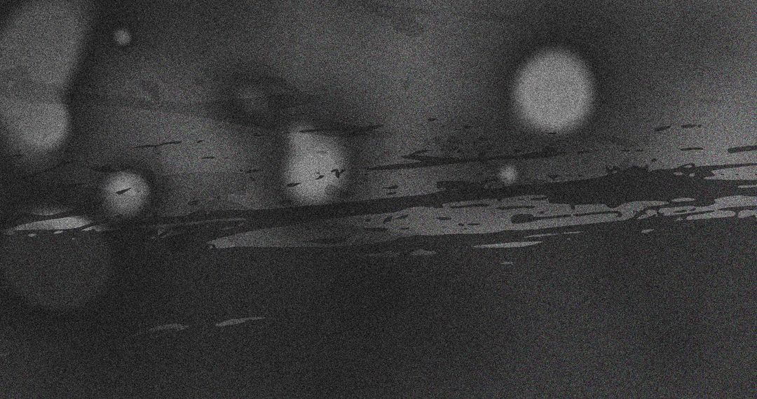 Abstract Grey Smudges and Spots on Dark Background