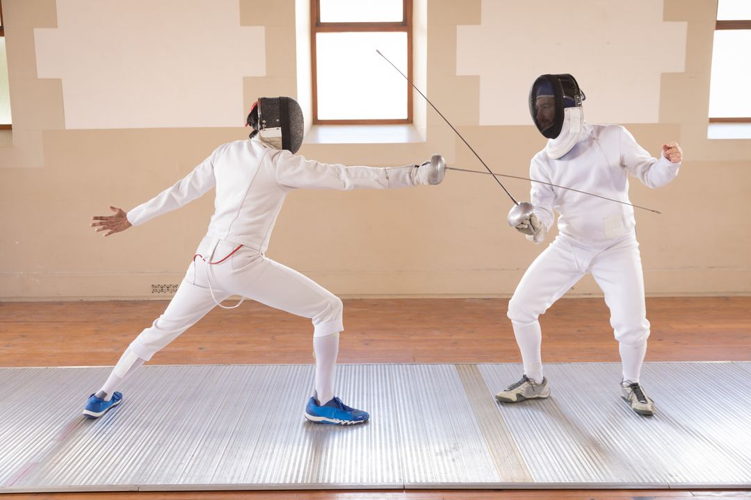 People wearing fencing protective outfits - Free Images, Stock Photos and Pictures on Pikwizard.com