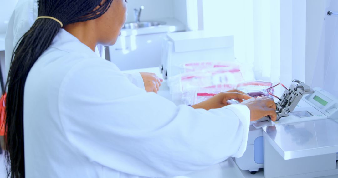 Scientist working in laboratory analyzing samples with precision equipment - Free Images, Stock Photos and Pictures on Pikwizard.com