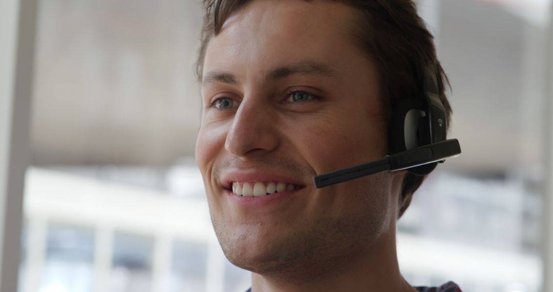 Smiling Customer Support Professional with Headset