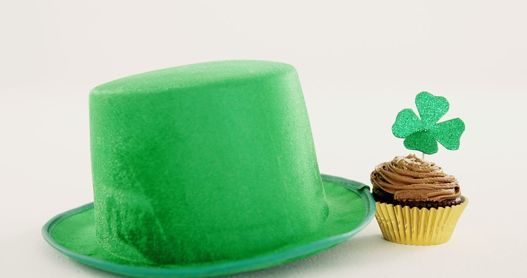 Festive St. Patrick's Day Hat and Cupcake Display - Free Images, Stock Photos and Pictures on Pikwizard.com