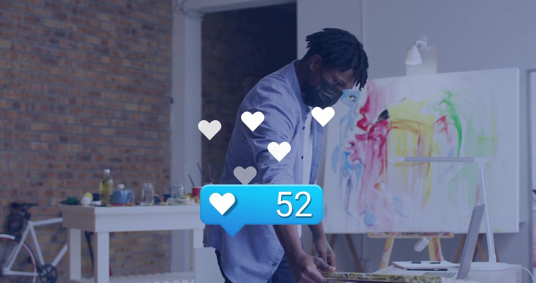 Creative Artist Painting in Studio with Social Media Engagement