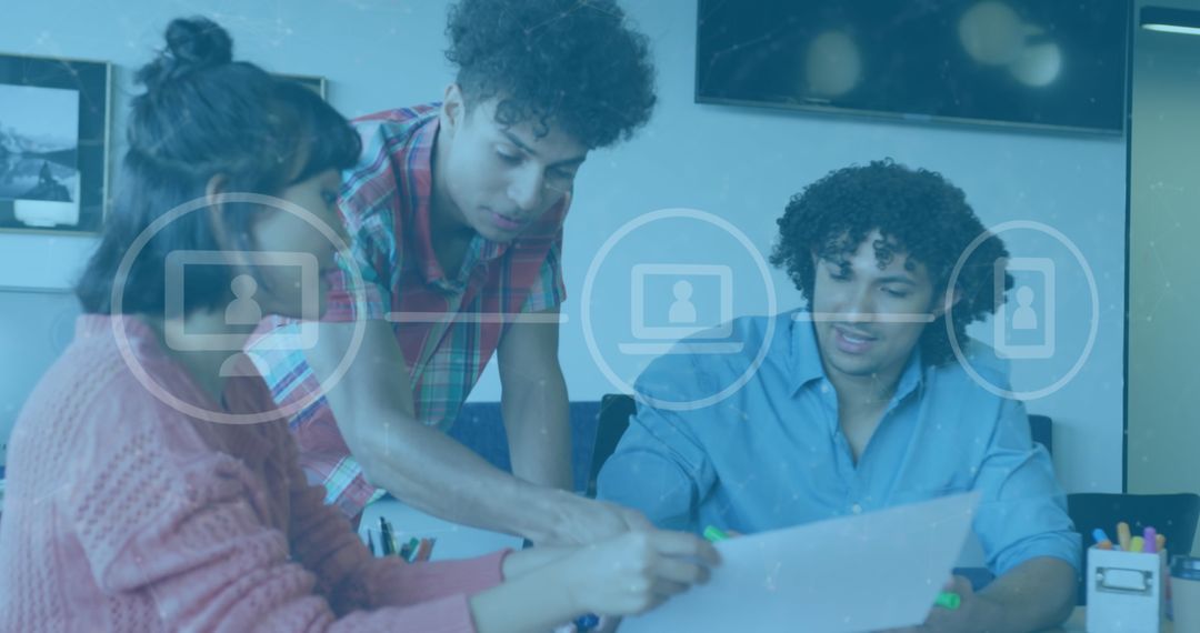 Diverse Team Collaborating Through Digital Media Interface in Modern Office