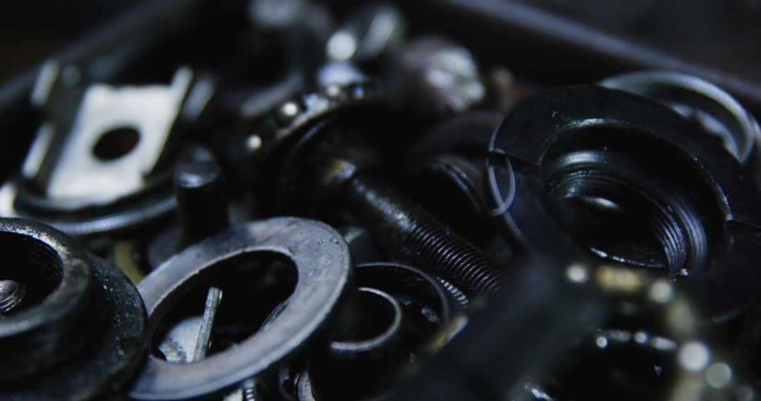 Close-up Mechanics Working with Bicycle Parts in Workshop