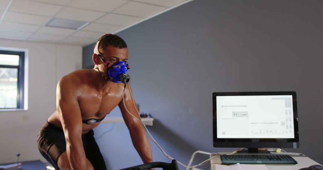 Athlete Undergoing VO2 Max Testing on Exercise Bike in Lab - Free Images, Stock Photos and Pictures on Pikwizard.com