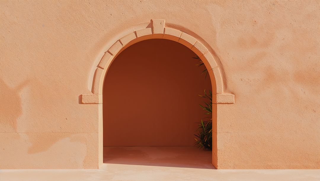Sunlit Terracotta Archway Casting Diagonal Shadow over Minimalist Courtyard Alcove