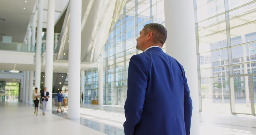 Business Professional Navigating Modern Office Lobby