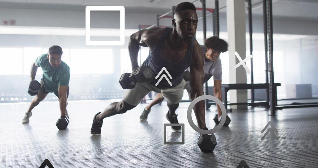 Diverse Team Performing Dynamic Plank Row Workout in Gym