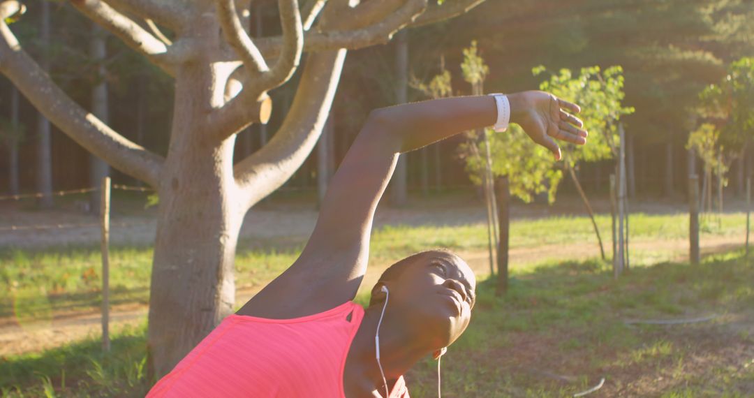 Young Woman Stretching Outdoors During Workout - Free Images, Stock Photos and Pictures on Pikwizard.com