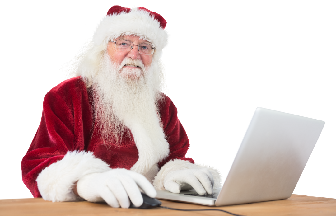 Santa Claus using laptop with transparent background - Download Free Stock Images Pikwizard.com