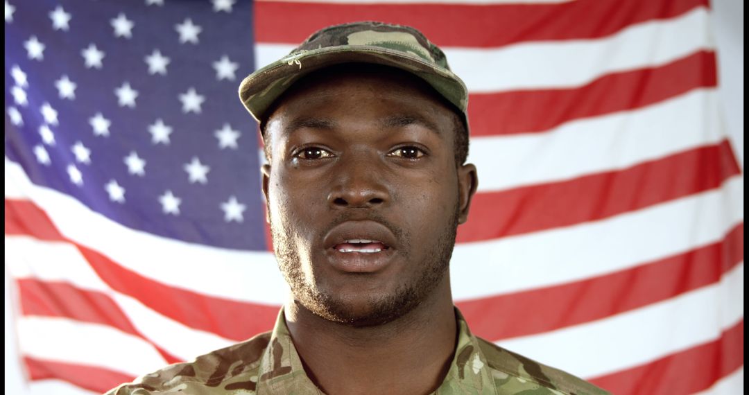 Portrait of African American Soldier Against American Flag - Free Images, Stock Photos and Pictures on Pikwizard.com