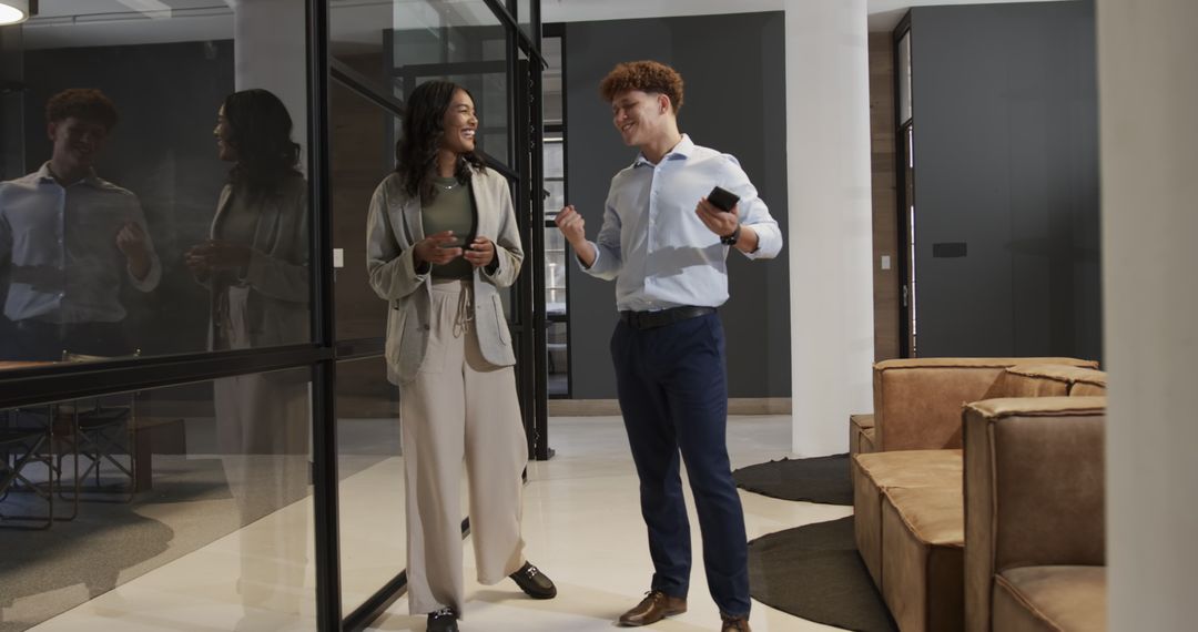 Diverse Professionals Discussing in Modern Office Setting