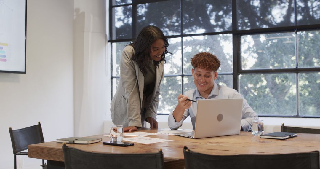 Creative Collaboration between Business Colleagues at Shared Workspace