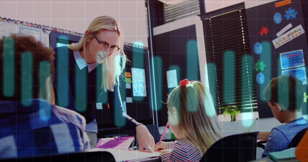 Teacher Leaning Over Students Guiding Worksheet Writing at Elementary Classroom Table