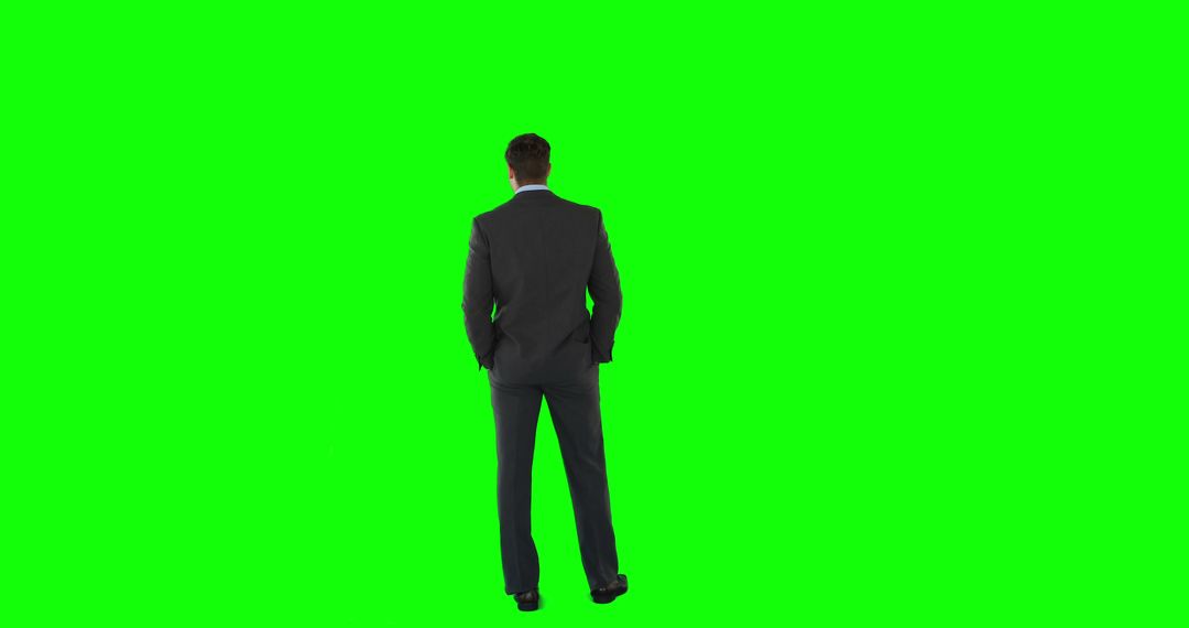 Businessman Against Green Screen Ready for Digital Editing