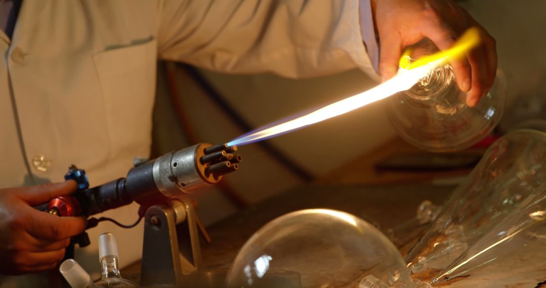 Chemist Using Bunsen Burner in Laboratory - Free Images, Stock Photos and Pictures on Pikwizard.com