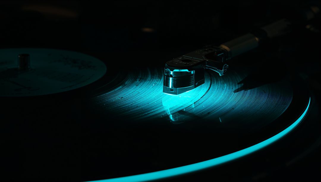 Tracking turntable tonearm tracing vinyl grooves with cyan rim glow macro reflection