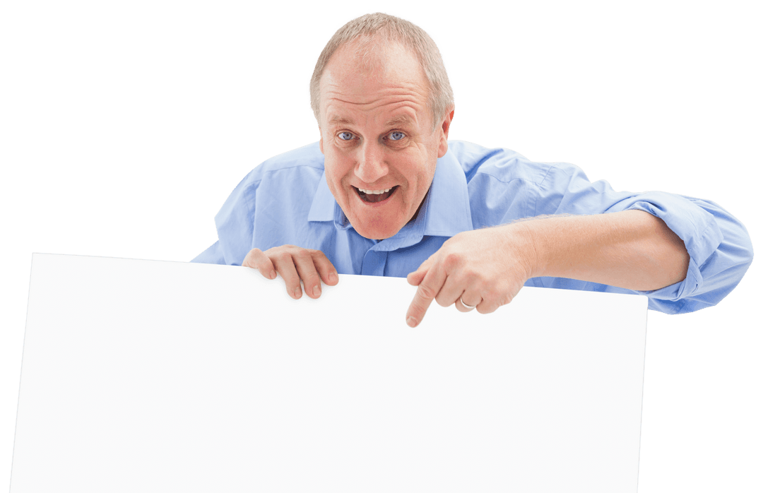 Mature Man Smiling Transparently Pointing at Blank Sign