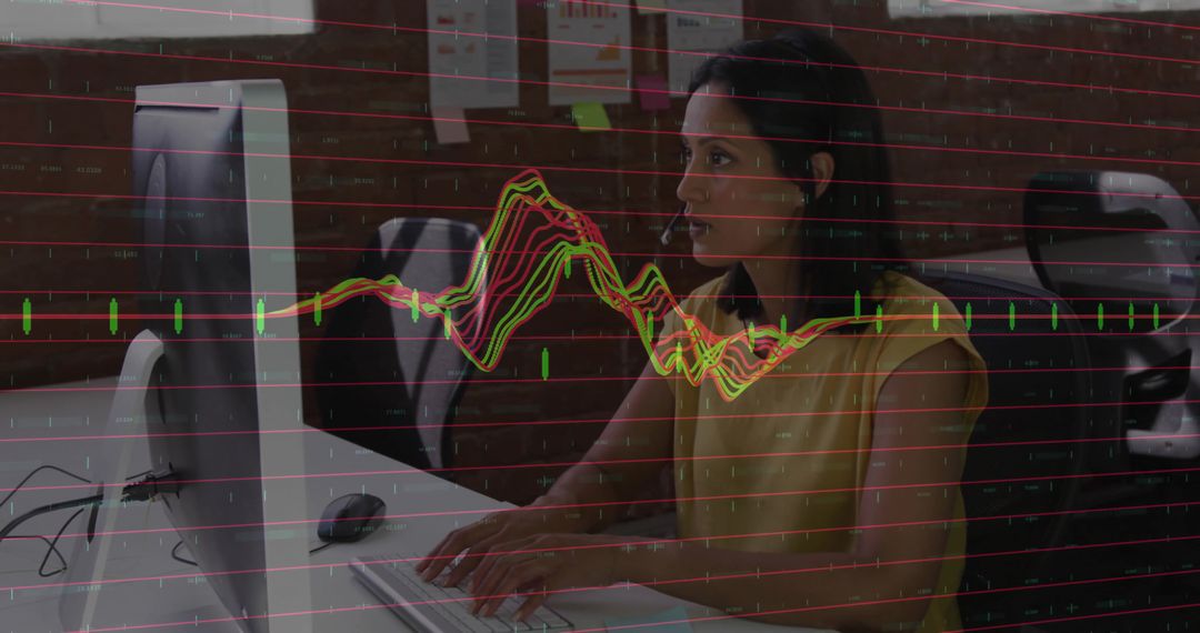 Businesswoman Analyzing Trends with Computer in Office