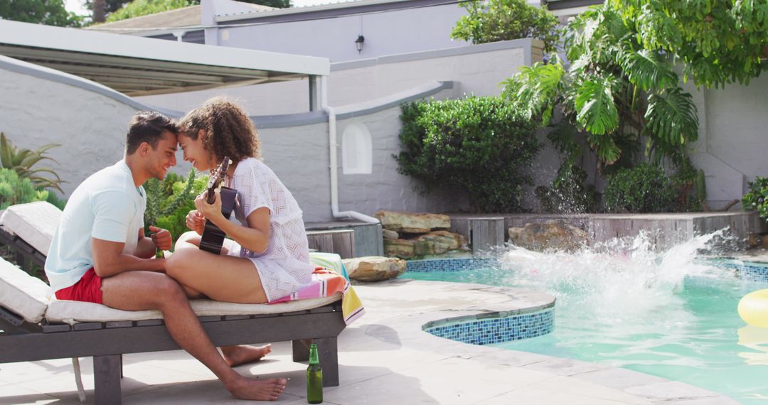 Couple Enjoying Poolside Guitar Session with Splashing Friend