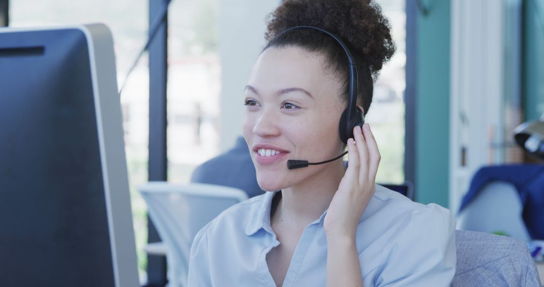 Smiling Female Call Center Agent Providing Customer Support - Free Images, Stock Photos and Pictures on Pikwizard.com