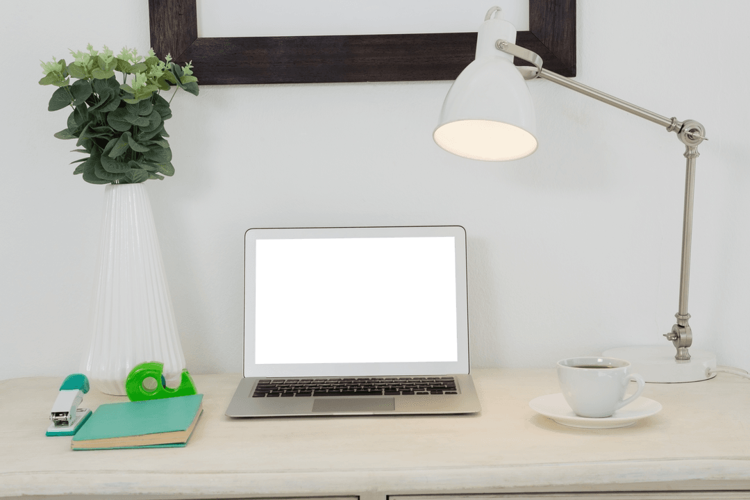 Transparent Laptop Display on Desk with Office Accessories