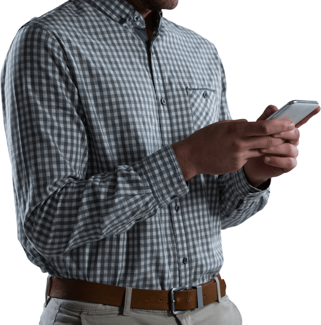 Man Typing Message on Smartphone in Gingham Shirt Transparent Background
