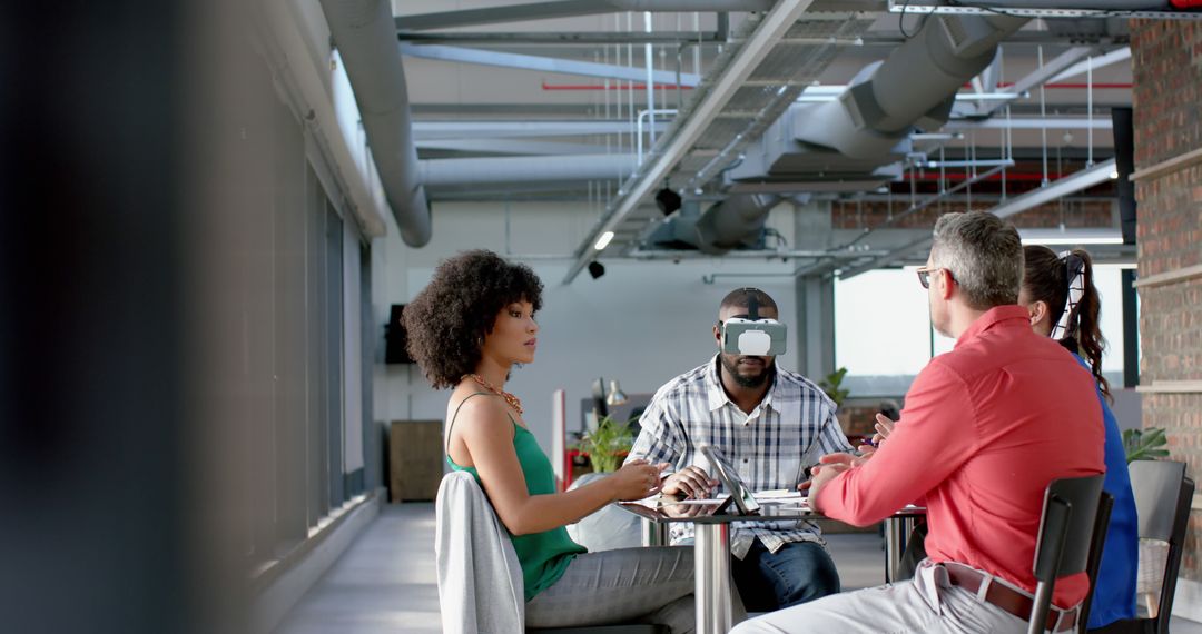 Diverse Team Collaborating in Modern Office with VR Technology - Free Images, Stock Photos and Pictures on Pikwizard.com