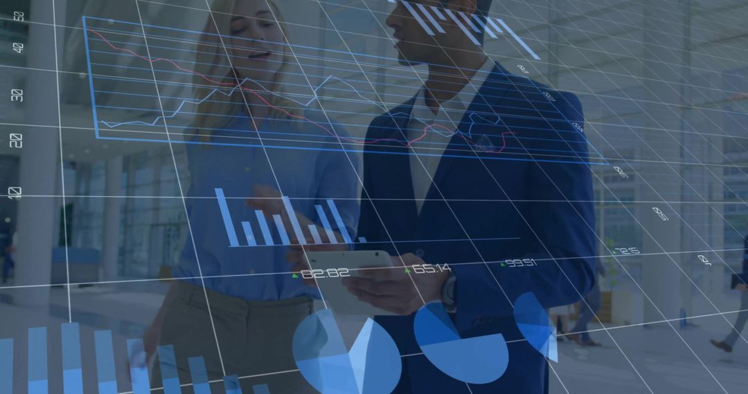 Team Analyzing Digital Financial Data Overlay in office