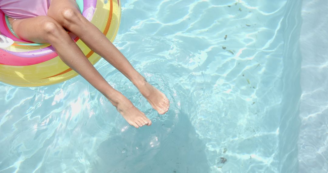 Relaxing Day in Pool with Inflatable Ring