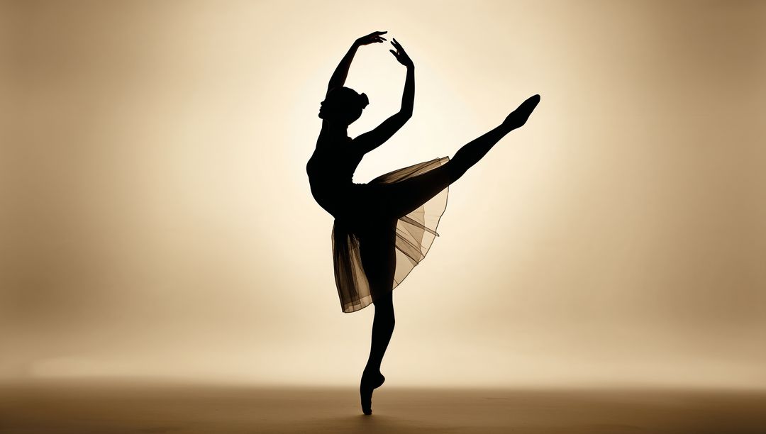 Ballet Dancer Silhouette Performing Arabesque on Pointe with Backlit Tulle Skirt