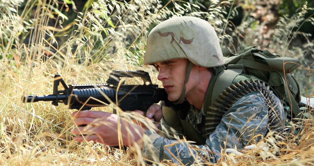 American Soldier Wearing Helmet and Holding Rifle in Field - Free Images, Stock Photos and Pictures on Pikwizard.com