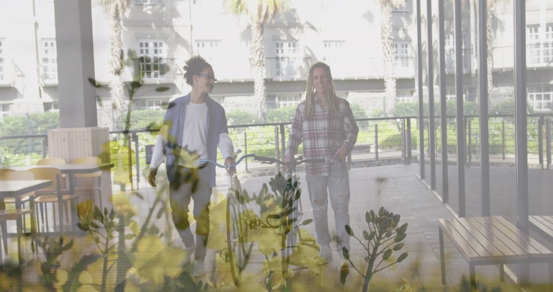 Eco-Friendly Commuters Walking with Bicycles Indoors