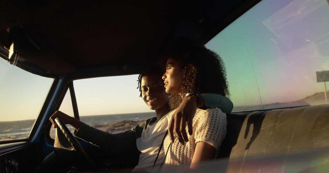 Young Couple Relaxing in a Car by the Beach at Sunset - Free Images, Stock Photos and Pictures on Pikwizard.com