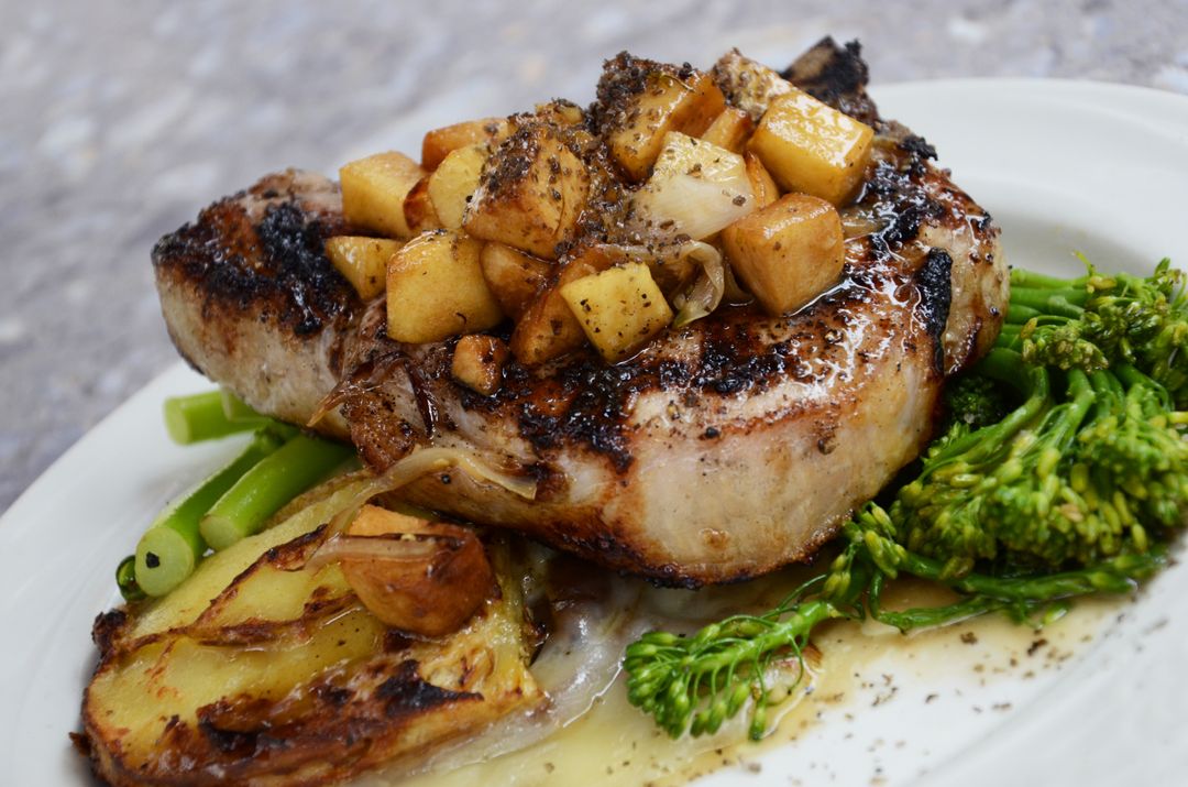 Seared Pork Chop with Apple Compote, Roasted Potatoes and Broccolini for Gourmet Menu
